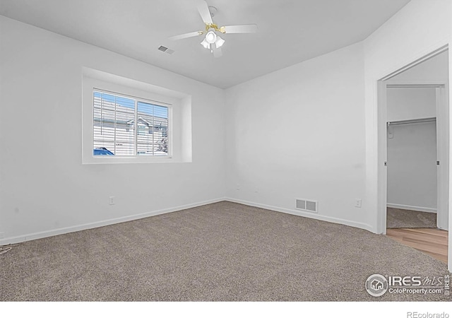 5151 29th St W Unit 204, Greeley, CO 80634 - carpeted spare room with ceiling fan and baseboards