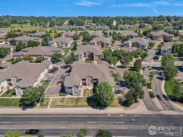 5151 29th St W Unit 204, Greeley, CO 80634 - aerial view of property and surrounding area with nearby suburban area
