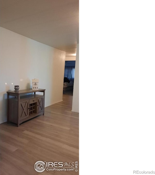 15296 County Road 39, Sterling, CO 80751 - corridor with wood finished floors