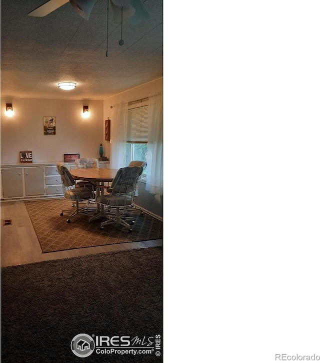 15296 County Road 39, Sterling, CO 80751 - dining space with wood finished floors