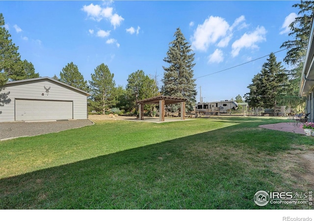 108 40th Ave, Greeley, CO 80634 - view of green lawn with a pergola and an outdoor structure