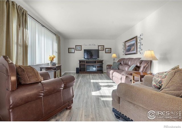 108 40th Ave, Greeley, CO 80634 - living area with wood finished floors and baseboards