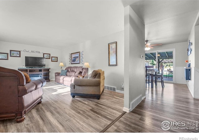 108 40th Ave, Greeley, CO 80634 - living area featuring wood finished floors and a ceiling fan