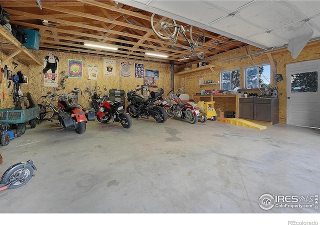 108 40th Ave, Greeley, CO 80634 - garage featuring a workshop area