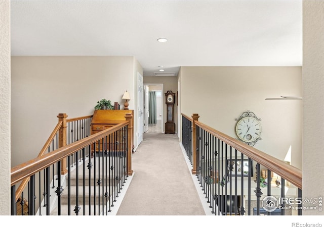 11722 Elmer Linn Dr, Longmont, CO 80504 - corridor with an upstairs landing, carpet flooring, and recessed lighting