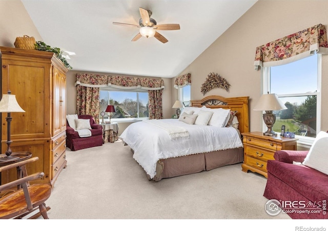 11722 Elmer Linn Dr, Longmont, CO 80504 - bedroom with lofted ceiling, light carpet, multiple windows, and a ceiling fan