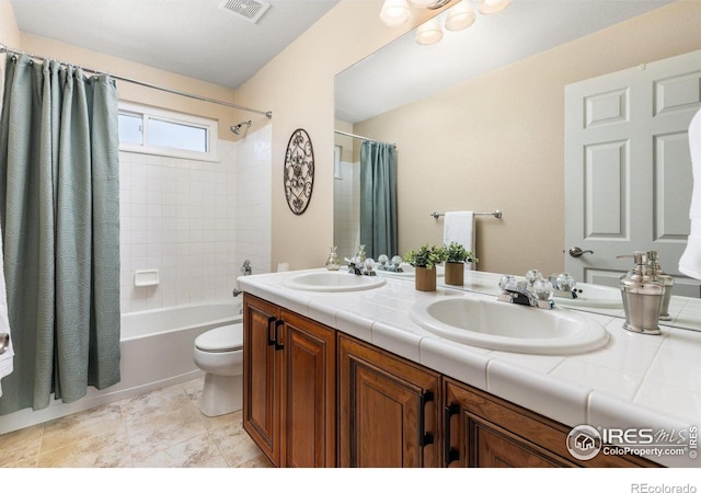 11722 Elmer Linn Dr, Longmont, CO 80504 - bathroom with shower / tub combo with curtain and double vanity