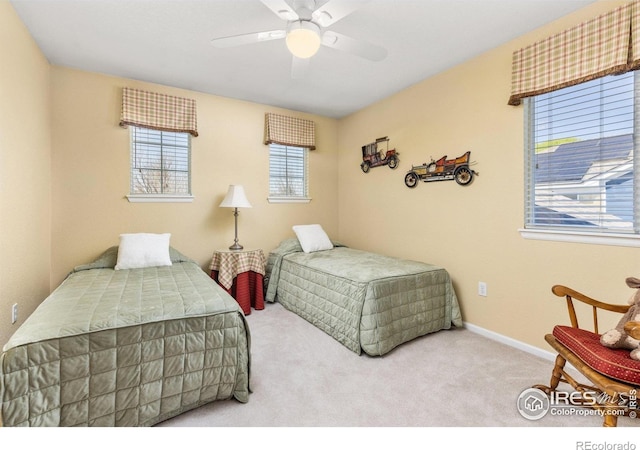11722 Elmer Linn Dr, Longmont, CO 80504 - carpeted bedroom featuring a ceiling fan and baseboards