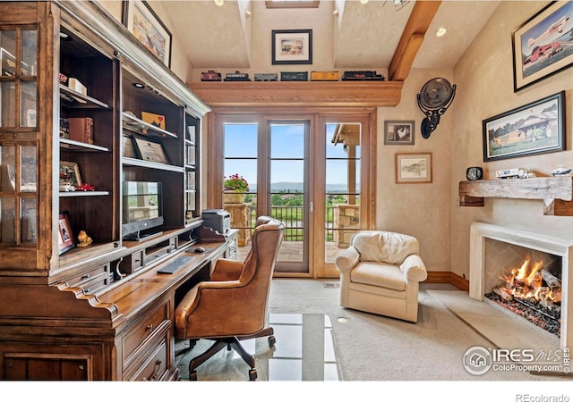 6619 Ridgeline Dr, Timnath, CO 80547 - home office featuring light colored carpet and a warm lit fireplace