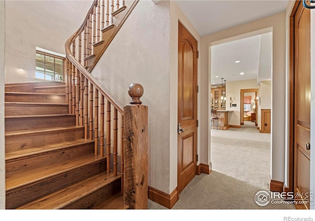 6619 Ridgeline Dr, Timnath, CO 80547 - stairway with carpet flooring and baseboards