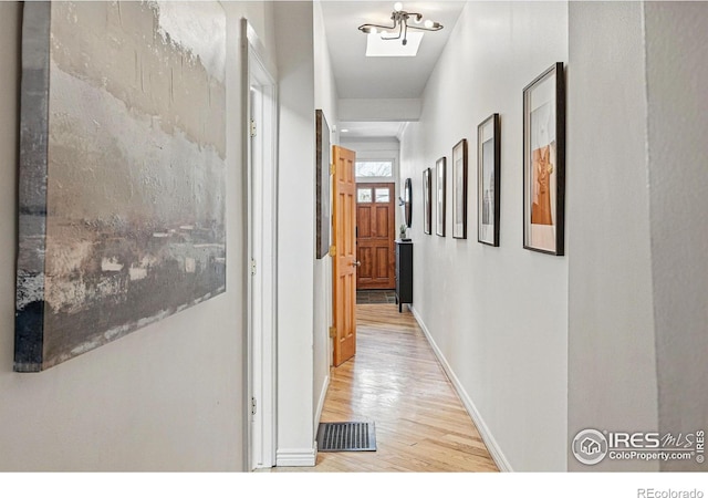 2955 Columbine St, Denver, CO 80205 - hallway featuring light wood-style flooring and baseboards