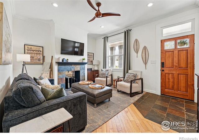 2955 Columbine St, Denver, CO 80205 - living room featuring ornamental molding, healthy amount of natural light, recessed lighting, a ceiling fan, and a tiled fireplace