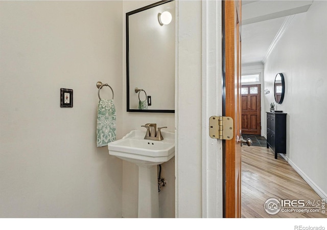 2955 Columbine St, Denver, CO 80205 - bathroom with crown molding and wood finished floors
