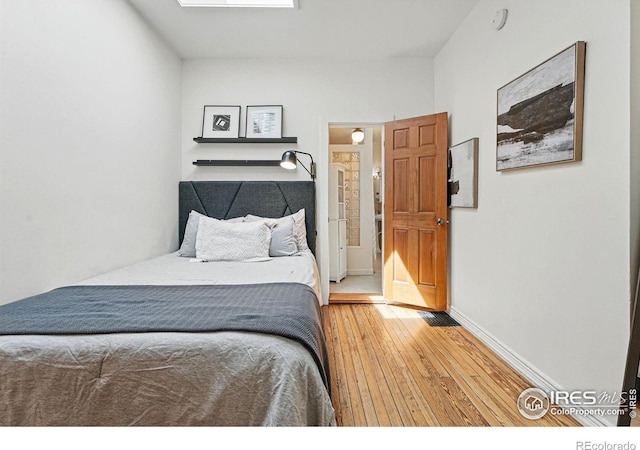 2955 Columbine St, Denver, CO 80205 - bedroom with wood-type flooring and baseboards