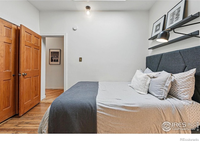 2955 Columbine St, Denver, CO 80205 - bedroom featuring wood finished floors and baseboards