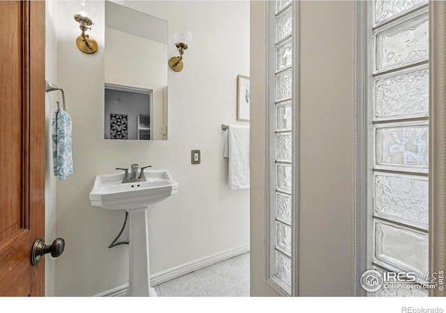 2955 Columbine St, Denver, CO 80205 - bathroom with tile patterned floors and baseboards
