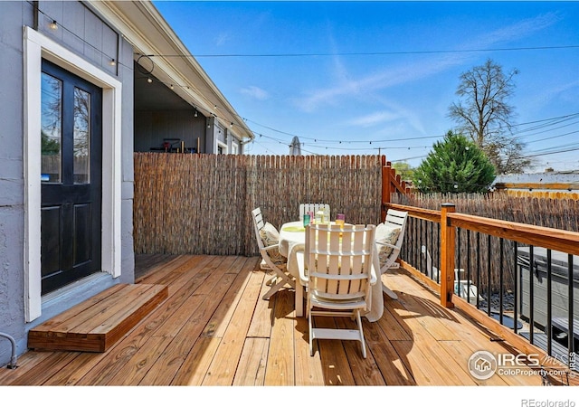 2955 Columbine St, Denver, CO 80205 - wooden deck with outdoor dining area