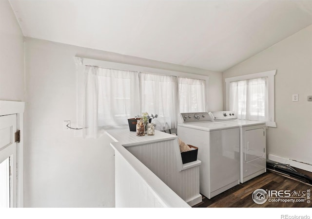 834 Emery St, Longmont, CO 80501 - washroom with washer and clothes dryer and dark wood-style floors