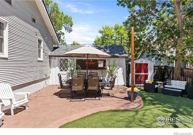 834 Emery St, Longmont, CO 80501 - view of patio with a storage shed, outdoor lounge area, and outdoor dining space