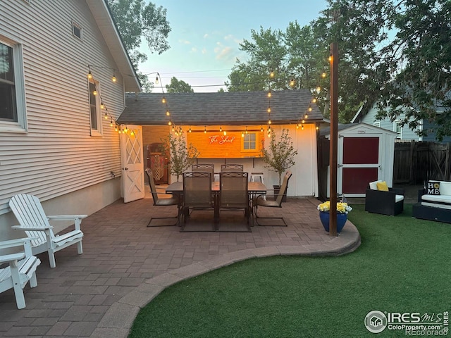 834 Emery St, Longmont, CO 80501 - view of patio / terrace featuring a shed and outdoor dining area