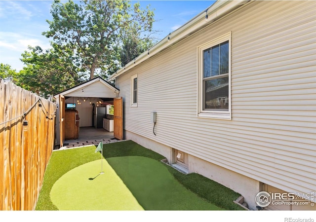 834 Emery St, Longmont, CO 80501 - view of yard with a putting green