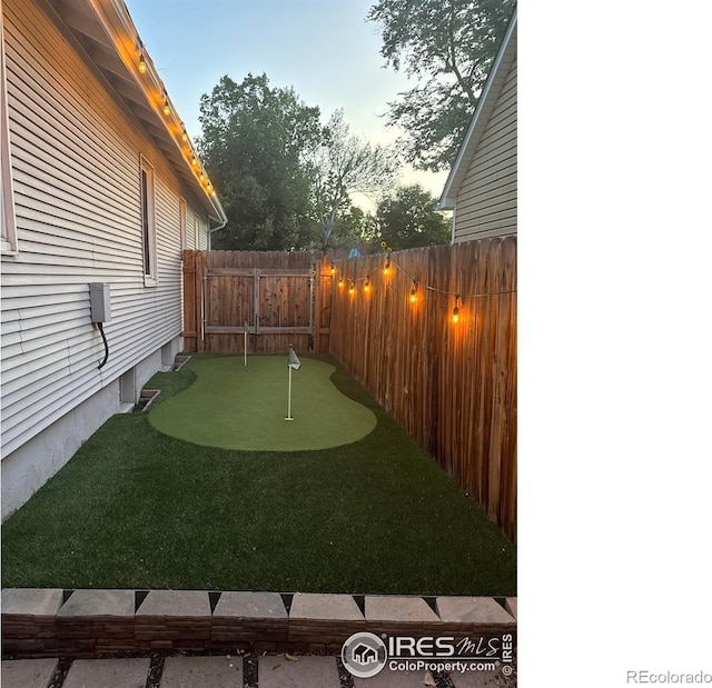 834 Emery St, Longmont, CO 80501 - view of yard with an area to practice putting