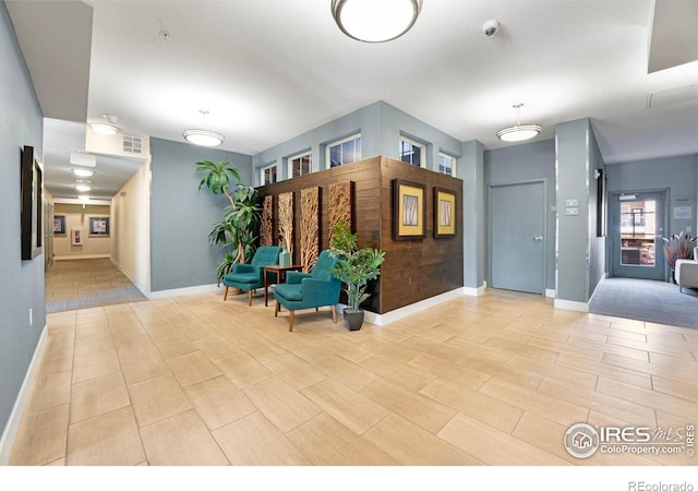 13598 Via Varra Unit 412, Broomfield, CO 80020 - community lobby with a surveillance system