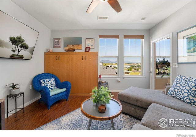 13598 Via Varra Unit 412, Broomfield, CO 80020 - living room featuring wood finished floors and a ceiling fan