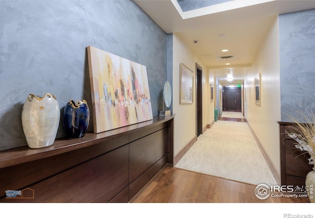1077 Canyon Blvd # 403, Boulder, CO 80302 - corridor featuring wood finished floors and wallpapered walls