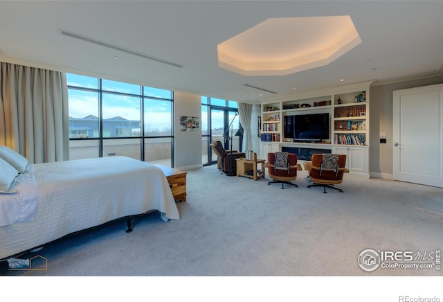 1077 Canyon Blvd # 403, Boulder, CO 80302 - bedroom featuring a raised ceiling and carpet floors