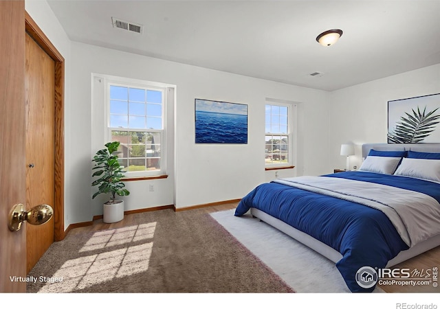 3233 Baldwin Ave, Evans, CO 80620 - bedroom featuring carpet and baseboards