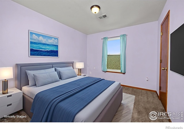 3233 Baldwin Ave, Evans, CO 80620 - carpeted bedroom featuring baseboards