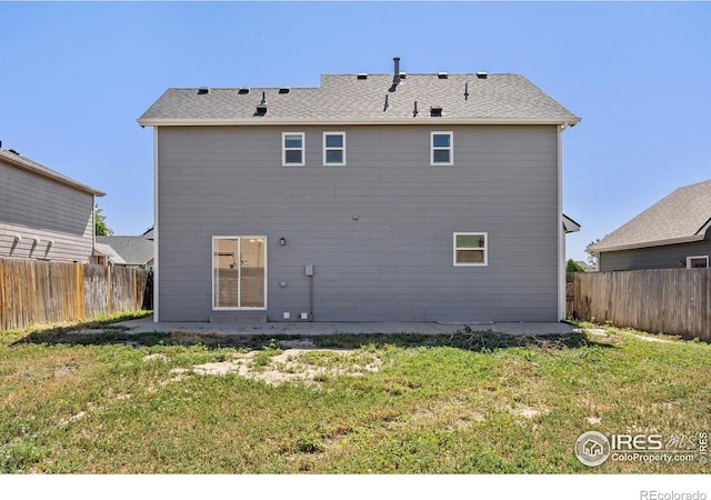 3233 Baldwin Ave, Evans, CO 80620 - back of house with a fenced backyard