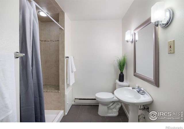 1220 Solstice Ln, Fort Collins, CO 80525 - bathroom with a baseboard heating unit, tile patterned floors, and a tile shower