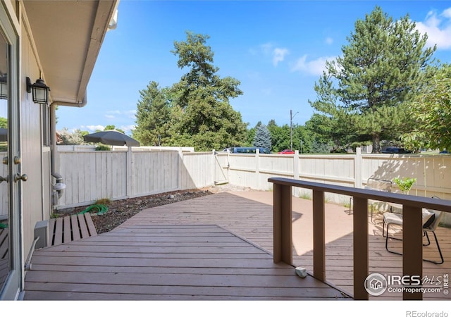 1220 Solstice Ln, Fort Collins, CO 80525 - wooden deck with a fenced backyard