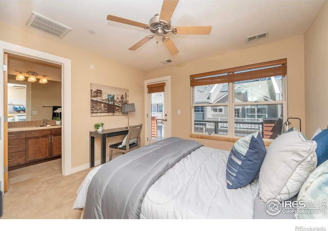 5060 Pierre St Unit E, Boulder, CO 80304 - bedroom with multiple windows, light carpet, a ceiling fan, and ensuite bathroom