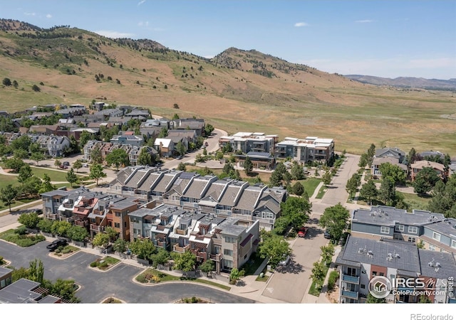 5060 Pierre St Unit E, Boulder, CO 80304 - aerial overview of property's location featuring nearby suburban area and a mountain backdrop