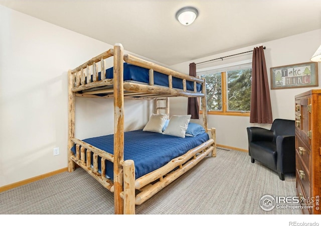 1437 Raven Cir Unit A, Estes Park, CO 80517 - carpeted bedroom featuring baseboards