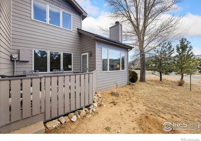 1437 Raven Cir Unit A, Estes Park, CO 80517 - view of side of property with a chimney