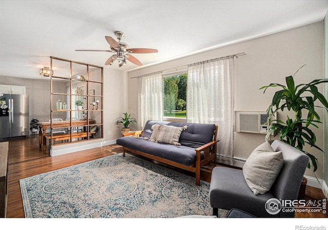 705 E Drake Rd Unit 45, Fort Collins, CO 80525 - living room featuring a ceiling fan, wood finished floors, and a wall mounted AC