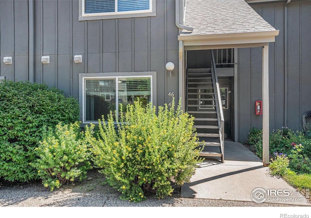 705 E Drake Rd Unit 45, Fort Collins, CO 80525 - entrance to property featuring board and batten siding and a shingled roof