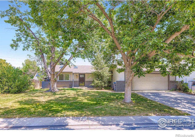 1287 Doric Dr, Lafayette, CO 80026 - view of front facade featuring a garage, concrete driveway, and stucco siding