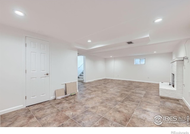 1287 Doric Dr, Lafayette, CO 80026 - basement with stairs, recessed lighting, and a fireplace