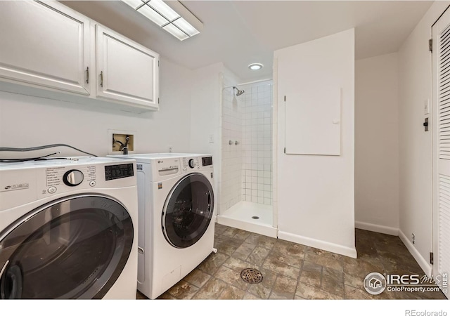 1287 Doric Dr, Lafayette, CO 80026 - laundry room featuring independent washer and dryer and stone finish flooring