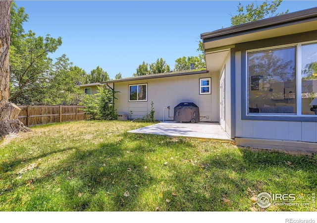 1287 Doric Dr, Lafayette, CO 80026 - view of yard featuring a patio