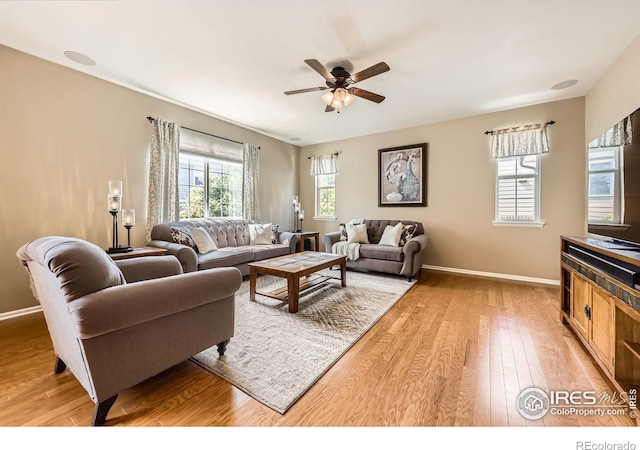 13065 Tamarac Pl, Thornton, CO 80602 - living room featuring light wood-type flooring and a ceiling fan