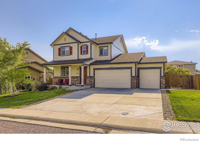 13065 Tamarac Pl, Thornton, CO 80602 - craftsman house featuring a porch, driveway, a garage, stone siding, and roof with shingles
