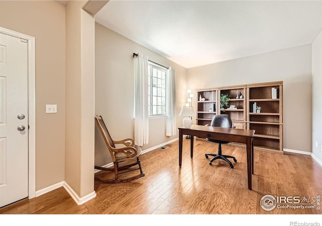 13065 Tamarac Pl, Thornton, CO 80602 - home office with light wood-style floors
