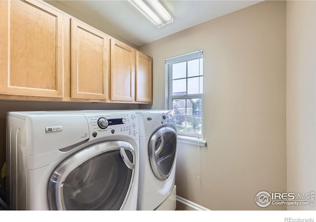 13065 Tamarac Pl, Thornton, CO 80602 - laundry room featuring washing machine and dryer and cabinet space