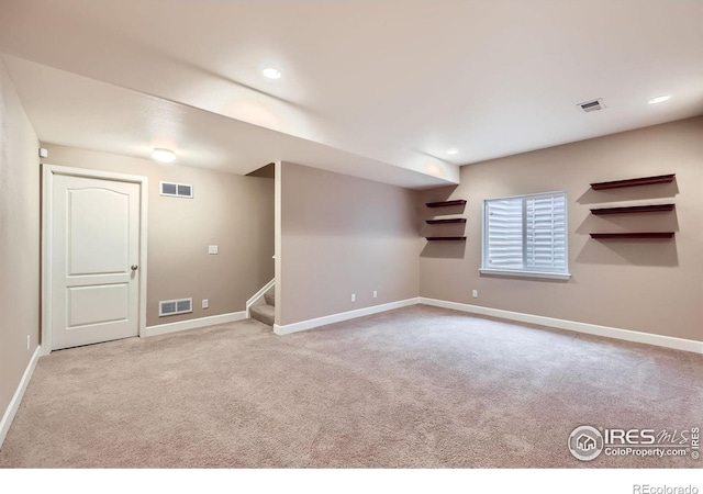 13065 Tamarac Pl, Thornton, CO 80602 - finished below grade area with carpet, stairway, and recessed lighting